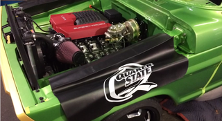 Illustration for article titled A CTS-V Powered Ford F-100 Is An Awesome Way To Advertise Your Shop